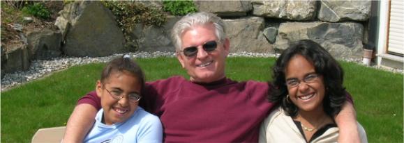 Carl Palmer and his granddaughters, Audrea and Alexis